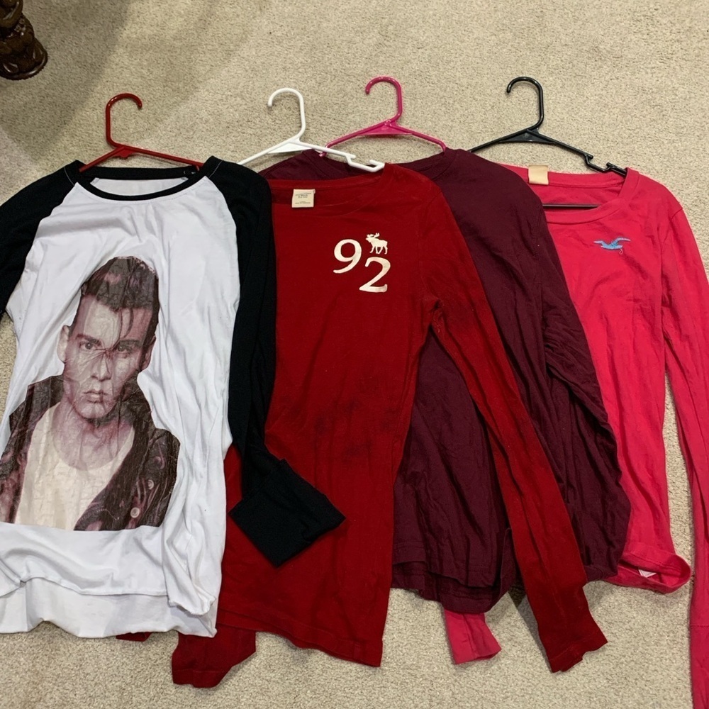 Long sleeve women’s shirts in size large. 4 shirts included bundle.